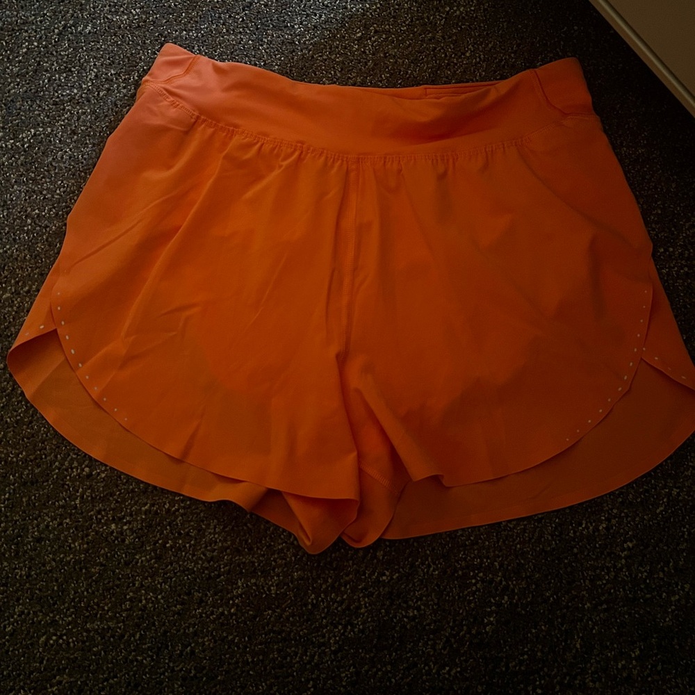 Women’s fast and free HR short in Coral kiss